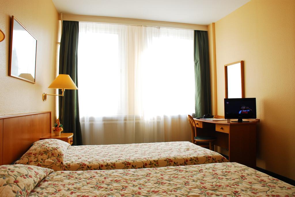 Doppel- oder Zweibettzimmer