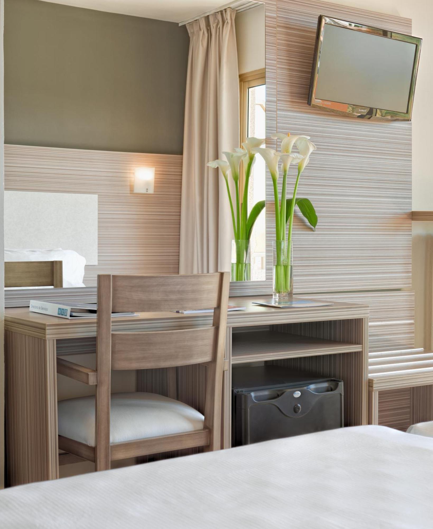 Habitación Doble con cama supletoria (3 adultos)