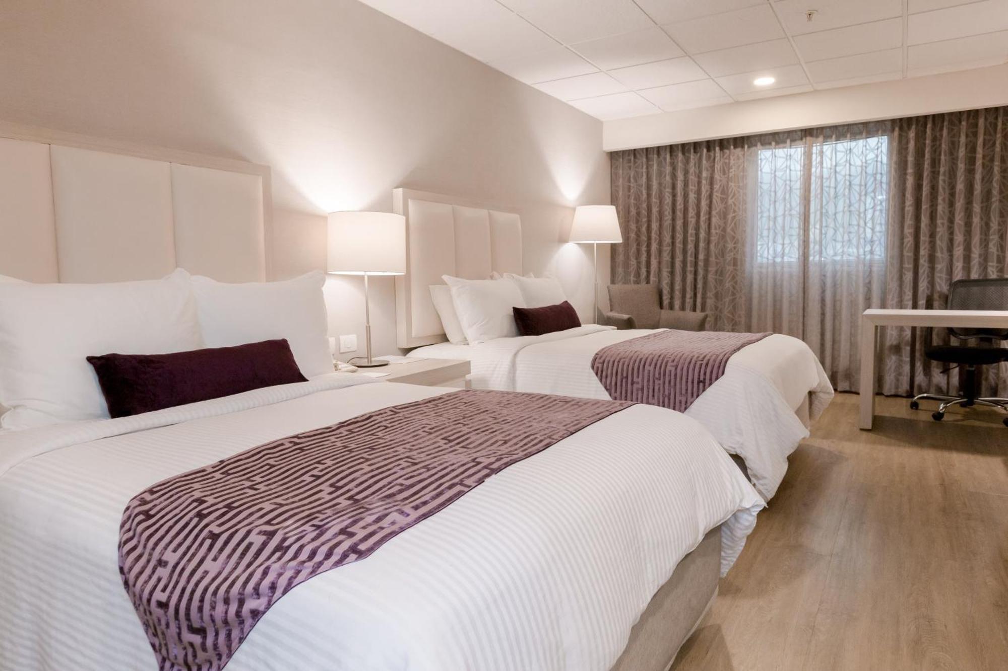 Deluxe Tweepersoonskamer met 2 Tweepersoonsbedden