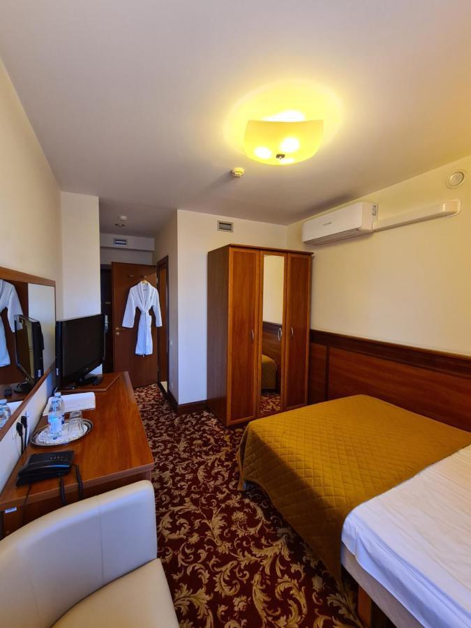 Einzelzimmer mit Zugang zur Sauna und zum Whirlpool