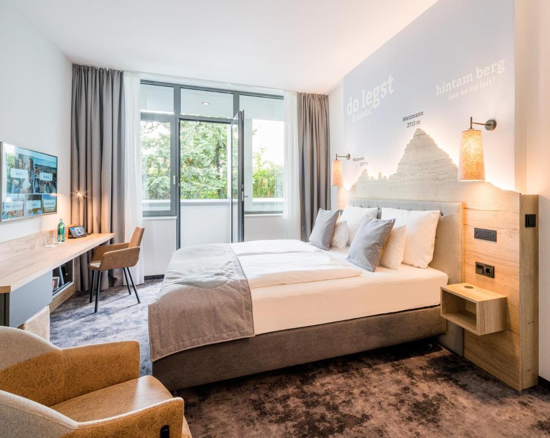 Suite Junior Executive con ducha a ras de suelo y balcón
