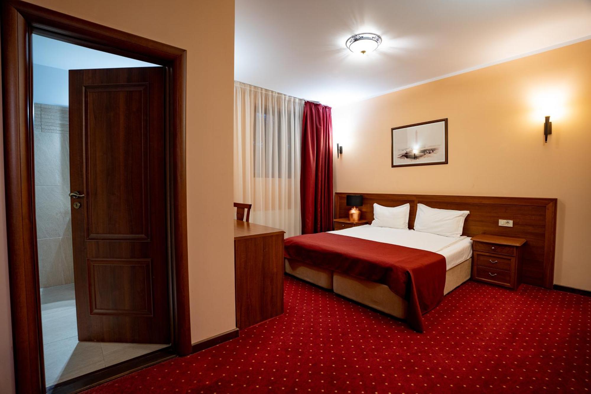 Doppel- oder Zweibettzimmer