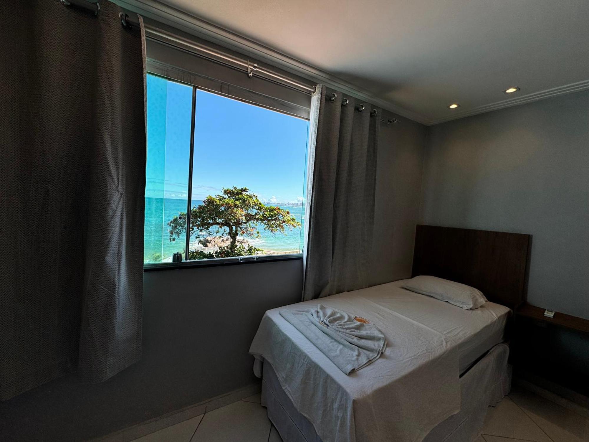 Quarto Quádruplo com Vista Mar