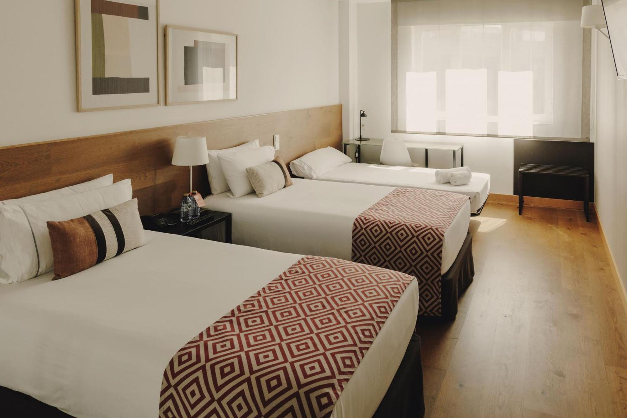 Habitación Doble con cama supletoria - 1 o 2 camas