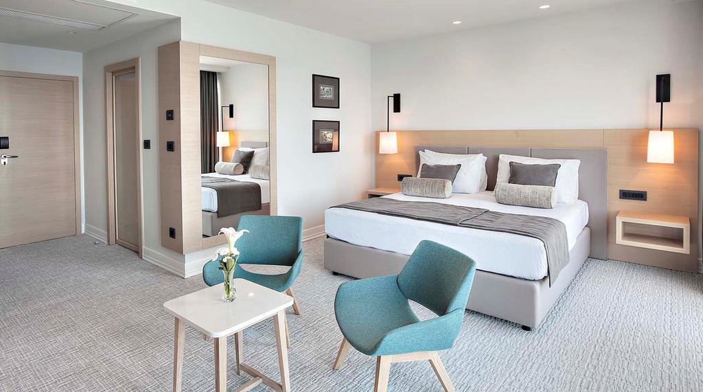 Suite Premium avec Balcon - Vue sur Toits de la Ville