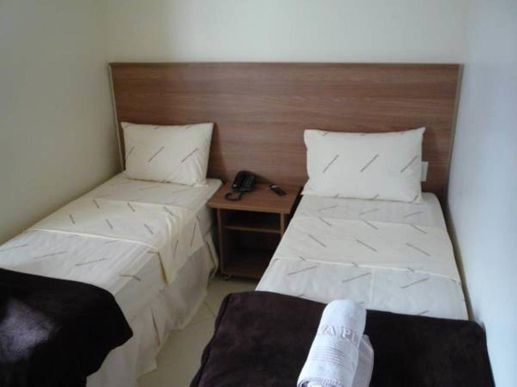 Quarto Clássico com Cama de Casal ou 2 de Solteiro